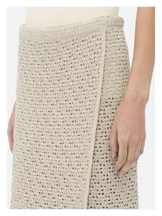 Imagine wrapping yourself in the elegance of Bottega Veneta clothing, where style meets comfort effortlessly. This skirt's crochet effect adds a playful touch that's perfect for those sunny days when you want to feel a bit fancy yet utterly relaxed. Made in Italy, it’s your go-to piece for a chic, carefree vibe. 100% cotton for breathable comfort Crochet effect for a unique texture Made in Italy for a touch of luxury Versatile ecru color Perfect fit with standard sizing | Bottega Veneta Women's Cotton Wrap Skirt, Stone Island Clothing, Color Bone, Valentino Clothing, Skirt For Women, Occasion Shoes, Crochet Skirt, Comfort Design, Tshirt Skirt