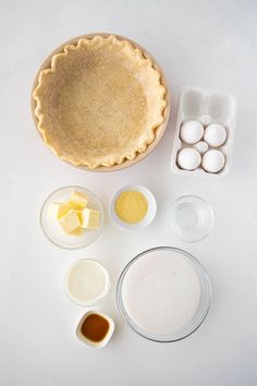 ingredients for pie laid out on a white surface