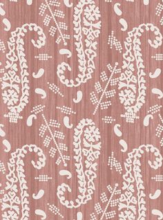 a pink and white pattern on fabric