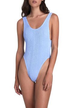 Made from super-resilient ribbed seersucker with a retro crinkled finish, this '80s-inspired one-piece features a low scooped back and cheeky coverage. Scoop neck Cheeky back coverage 95% nylon, 5% elastane Hand wash, dry flat Imported Spring Textured Swimwear For Pool, Textured Swimwear For Poolside Spring, Textured Swimwear For Spring Poolside, Ribbed Beachwear Swimwear For Spring, Ribbed Swimwear For Summer Pool, Fitted Textured Blue Swimwear, Blue Textured Fitted Swimwear, Casual Textured Swimwear, Textured Blue Swimwear For Summer