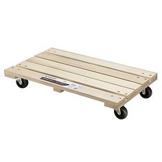 a wooden pallet with two wheels on the bottom and one wheel attached to it