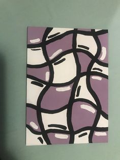 a purple and white abstract painting on a green wall