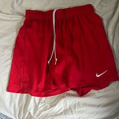 Short Style Basketball Shorts Nike Size Small Never Worn! Red Bottoms With Elastic Waistband And Short Leg, Red Athletic Shorts For Spring, Nike Red Bottoms With Elastic Waistband, Nike Red Athletic Shorts, Nike Sporty Red Bottoms, Sporty Red Nike Bottoms, Casual University Red Bottoms In Short Length, Casual University Red Short Bottoms, Casual University Red Short-length Bottoms