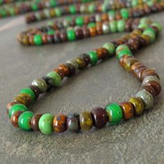 A gorgeous mix of Czech glass color! A blend of greens, brown, red and black - all with a rich picasso finish. The beads are a size 6/0, measure approximately 4, with a 1mm hole - however they are not a precise cut and match, and size varies. You'll receive a strand of approximately 9 to 10 inches, with an average of 90 to 97 beads per strand - note, beads may be loose. Return to my shop here: https://www.etsy.com/shop/BobbiThisnThat More picasso seed bead mixes here: https://www.etsy.com/ca/sho Picasso Blue, Seahorse Pendant, Bubble Envelopes, Glass Color, Blue Opal, Seed Bead, Red And Black, 10 Inch, Czech Glass