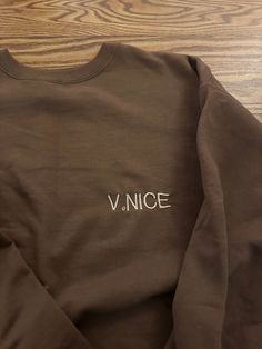 VeNICE embroidered crewneck as seen on TikTok, embroidered in Venice Beach Perfect for anyone visiting or living in Venice Beach California Dark brown crewneck with beige embroidered text Sizing is UNISEX. Machine wash cold, air dry advised. All items embroidered to order so all sales are final. Trendy Crew Neck Hoodie With Embroidered Logo, Trendy Crew Neck Hoodie With Letter Embroidery, Trendy Hoodie With Letter Embroidery And Crew Neck, Brown Cotton Sweatshirt With Embroidered Logo, Brown Crew Neck Top With Embroidered Logo, Brown Long Sleeve Sweatshirt With Embroidered Logo, Trendy Crew Neck Sweatshirt With Custom Embroidery, Casual Sweatshirt With Custom Embroidery Relaxed Fit, Casual Relaxed Fit Sweatshirt With Custom Embroidery