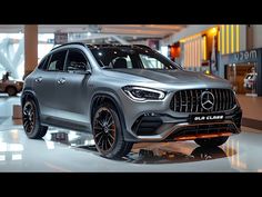 the mercedes gla suv is on display at an auto show