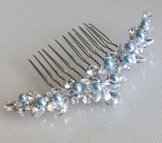 Blush Blue Light Blue Pearl Cubic Zirconia Silver Vintage Style Wedding Bridal Side Hair Comb. This item is ready to ship PLEASE READ ITEM DESCRIPTION and SHOP POLICIES before placing your order, and contact me with any questions! Hair comb size approx. 3.54 inches (9cm) wide, and 2.16 inches (5.5cm) high including silver comb. HAIR ACCESSORIES SECTION: https://www.etsy.com/shop/LanaChayka?ref=seller-platform-mcnav§ion_id=22670998 Beautiful and sparkly, this dainty hair piece would be great for Elegant Blue Hair Accessories For Party, Elegant Blue Hair Accessories For Formal Occasions, Light Blue Hair Accessories, Bridal Side Hair, Baby Blue Hair Pin, Blue Pearl Hair Pin, Wedding Sides, Sapphire Hair Comb, Blue Wedding Hair