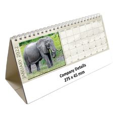 a desk calendar with an elephant photo on the front and side of it's cover