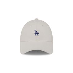 The Los Angeles Dodgers Cozy Women's 9FORTY Adjustable Hat features an embroidered Dodgers mini logo at the front panels with a gray undervisor and an adjustable D-Ring closure at the rear. Gray Hat With Logo Patch And Curved Brim, Winter Baseball Cap With Embroidered Logo, Winter Baseball Cap With Embroidered Logo And Curved Brim, Winter Sporty Curved Brim Baseball Cap, Urban Curved Bill Hat With Embroidered Logo, Urban Hat With Embroidered Logo And Curved Bill, Casual Hat With Letter Patch And Curved Brim, Winter Six-panel Baseball Cap For Streetwear, Gray Baseball Cap With Embroidered Logo