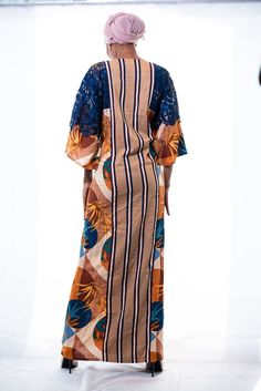 DESIGNER'S NOTE: Cotton Kaftan Maxi Dress. Envelope yourself in comfortable elegance wearing this floor-skimming kaftan that artfully fuses 3 different fabrics to stunning effect. The mixed print cotton used for the kaftan is beautifully complemented by dramatic lace sleeves and the striped brown and navy striped cotton used in the middle. Designed to flatter your curves. Comfy chic. And it has pockets!CUSTOM MADE: Designed especially for you to ensure a perfect fit according to your height and Multicolor Maxi Kaftan With Printed Motifs, Multicolor Printed Maxi Kaftan, Batik Print Maxi Length Kaftan, Multicolor Long Sleeve Block Print Kaftan, Traditional Multicolor Maxi Dress With Kimono Sleeves, Multicolor Block Print Kaftan With Kimono Sleeves, Floral Print Patterned Kaftan With Kimono Sleeves, Patterned Kaftan With Floral Print And Kimono Sleeves, Long Multicolor Kaftan With Batik Print