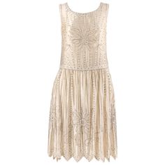 1920s Embellished Cocktail Flapper Dress, 1920s Embellished Flapper Cocktail Dress, Gatsby Style Embellished Dress For Vintage Events, Art Deco Embellished Flapper Dress For Vintage Events, Art Deco Embellished Dresses For Vintage Style, Elegant Gold Flapper Dress For Formal Occasions, Elegant Gold Formal Flapper Dress, 1920s Embellished Flapper Dress For Wedding, Elegant Beaded Dresses For Vintage Events