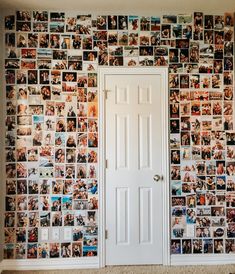 a white door sitting in front of a wall covered with many different pictures on it