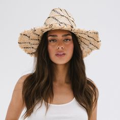 Gigi Pip straw hats for women - Gemma Wide Brim Straw - handwoven palm straw fedora with a fringed edge for a bohemian vibe Bohemian Fedora Straw Hat For Warm Weather, Bohemian Fedora Panama Hat For Warm Weather, Natural Woven Fedora, Bohemian Straw Hat For Day Out, Chic Woven Fedora Straw Hat, Bohemian Brimmed Straw Hat For Warm Weather, Bohemian Fedora With Curved Brim For Warm Weather, Bohemian Straw Hat For Warm Weather, Chic Straw Panama Hat For Warm Weather