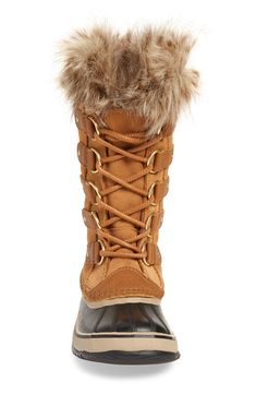 A warm, waterproof boot is designed with cozy faux-fur trim and features a lace-up panel that adjusts for a perfect fit. Comfort rated to -25 degrees Fahrenheit, it's built to keep your feet feeling warm and toasty when temperatures take a nose dive. 1 1/4" heel; 3/4" platform (size 8.5) 12" shaft; 16"–21" calf circumference Lace-up style Removable insole Seam-sealed waterproof construction Leather and synthetic upper/textile faux-fur trim/rubber sole Imported Women's Shoes Waterproof Lace-up Boots For Winter, Insulated Lace-up Boots For Winter, Winter Lace-up Boots With Faux Fur Trim, Fall Outdoor Boots With Faux Fur Trim, Sorel Joan Of Arctic, Sorel Joan, Waterproof Snow Boots, Snow Boot, Snow Boots Women