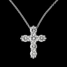 Forever One Moissanite Cross Necklace Gold Pendant Religious Symbol Christianity Six Stones The cross is one of the symbols, used by many religions, such as Christianity. In the end, the cross is the ultimate demonstration of God's power. Necklace is made of 14k white gold and contains shared prongs set forever one moissanites stones (1.75cttw). Cable, gold chain with lobster clasp is included with the price. We offer two different chain length: 16 inch and 18 inch. Dimensions: 19.5mm tall, 15mm Diamond Round Cross Necklace For Anniversary, Diamond Cross Pendant Necklace For Wedding, Wedding Diamond Necklace With Cross Pendant, Spiritual Diamond Cut Necklace For Anniversary, Wedding Necklace With Diamond Cut Cross Pendant, Diamond Cut Cross Necklace For Anniversary, Wedding Cross Pendant Necklace With Diamond Cut, Spiritual Diamond Necklace For Anniversary, Diamond White Cross Pendant Necklace For Wedding