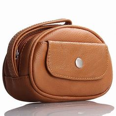 Genuine Italian Leather Wristlet / Wallet by FJ's Handbags Lend a touch of sophisticated edge to any outfit with a distinct FJ's Wristlet/Wallet. Product features: Material: Genuine Top Grain Cow Leather Color: Brown Top zipper close Hardware: Silver One Outside Snap pocket Single Hand Strap with lobster clasp Measurements: Width: 5.2 inches Height: 3.5 inches Depth: 2 inches Accessory Strap Length: 7.25 inches Accessory Strap Opening: 4.5 inches Weight (approx.): 4 oz. Monitor resolution and/or Brown Coin Purse For Mobile Phone Daily Use, Brown Mobile Phone Bag Coin Purse For Daily Use, Brown Mobile Phone Coin Purse For Daily Use, Compact Brown Bag With Coin Pocket, Compact Brown Bags With Coin Pocket, Brown Wristlet With Removable Pouch As Gift, Brown Travel Coin Purse, Portable Brown Coin Purse For Travel, Brown Leather Coin Purse