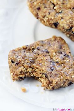 two pieces of granola on a white plate