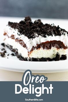 a piece of oreo delight dessert on a white plate with the title overlay