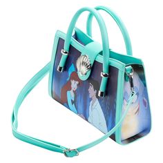 Splash into an adventurous tale with this Loungefly Disney The Little Mermaid Princess Scenes Series Crossbody Bag. Take a magical ride along the water with Eric and Ariel while a symphony of creatures and stars surrounds them for a romantic moment. Above them, a silver metal shell clasp closes the scene. On the left side panel, Ariel is delighted at the sight of seahorses, underwater. On the right panel, Ursula draws in Ariel’s golden voice. On the back, Ursula discusses the little matter of pa Eric And Ariel, Fin Fun Mermaid, Disney Purse, Disney The Little Mermaid, Ride Along, Disney Bag, Mermaid Princess, Loungefly Disney, Disney Outfits