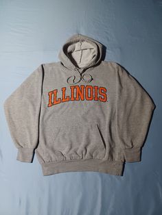 Beautiful quality OG Illinois Hoodie! Great collegiate style and great vintage feel. Tagged S, but fits bigger. Approx. 21 X 26. See pics for size and details! Classic piece. Vintage 1990s 2000s University of Illinois College Hoodie, Gray MV Sport S M Vintage Hoodie With Double-lined Hood For Sports, Casual Hooded Sweatshirt For Sports Events, Gray Varsity Hoodie Sweatshirt, Varsity Sweatshirt For College In Winter, Gray Varsity Hoodie For Streetwear, College Gray Fleece Hoodie, Winter College Varsity Sweatshirt, Gray Fleece Hoodie For College, Casual Hoodie With Drawstring Hood For Sports Events