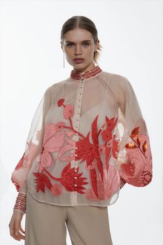 Organdie Applique Buttoned Woven Blouse | Karen Millen Festive Organza Blouse With Floral Embroidery, Elegant Festive Sheer Blouse, Festive Elegant Blouse With Sheer Sleeves, Luxury Long Sleeve Embellished Blouse, Festive Embroidered Organza Tops, Spring Luxury Party Blouse, Luxury Spring Party Blouse, Embroidered Long Sleeve Blouse For Party, Designer Long Sleeve Embellished Blouse