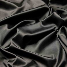 the black fabric is very soft and shiny