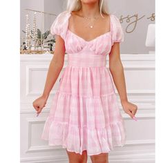 Our Pink Gingham Princess Dress Is A Short Puff Sleeve Gingham Plaid Pretty With Back Tie Detail. Also Available In Red, Blue, And Orange. Fit: Runs True To Size (Model Wearing A Size Small) Content: 100% Polyester New Without Tags Princess Dress Pink, Sassy Shortcake, Pink Plaid Dress, Pink Gingham Dress, Fancy Fits, School Dance Dresses, Pink And White Dress, Picnic Dress, Short Puff Sleeve