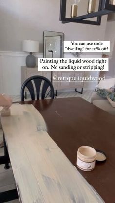 a wooden table sitting in front of a white wall with a quote above it that reads, you can use code while painting the liquid wood right on no sanding