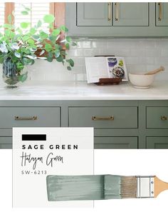 the sage green paint is being used on this kitchen counter