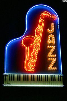 a neon sign with a saxophone on it