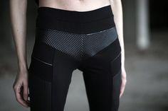 Alternative Style Stretch Pants For Night Out, Edgy Stretch Leather Pants For Streetwear, Modern Fitted Pants For Streetwear, Punk Style Fitted Leggings For Streetwear, Edgy Fitted Leather Pants, Edgy Fitted Pants For Alternative Fashion, Fitted Edgy Leather Pants, Black Cyberpunk Fitted Bottoms, Fitted Black Cyberpunk Bottoms