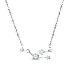 Celebrate her zodiac sign with this shimmering diamond inspiration necklace. Crafted in sterling silver, this petite Taurus constellation is created with sparkling diamonds in varying sizes connected by silver bars. Radiant with 1/5 ct. t.w. of diamonds and a bright polished shine, this constellation suspends centered along an 18.0-inch rope chain that secures with a spring-ring clasp. Celestial Sterling Silver Necklace With Single Cut Diamonds, Celestial Silver Diamond Necklace Gift, Celestial Style Silver Diamond Necklace Gift, Taurus Necklace, Taurus Constellation, Silver Bling, Constellation Necklace, Necklace Clasps, Silver Bars