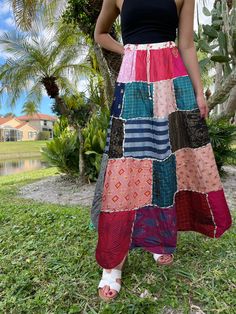 This Womens Beach Maxi Skirt features stunning shades of Pink, Blue patchwork designs and a retro, festive hippie vibe. Made with breathable, comfortable rayon fabric, this skirt boasts a mix of patterns including abstract, solid, striped, and floral prints. The vertical panels are highlighted by a wide "dori" running from the waist to the hem, adding a charming and versatile touch. Available in S/M, this skirt is a must-have for any woman who loves fashion. Fabric:- Rayon Measurements: Length 4 Long Flowing Dresses, Beach Maxi Skirt, Travel Skirt, Hippie Skirts, Wrap Skirts, Maxi Skirt Boho, Womens Maxi Skirts, Boho Chic Outfits, Flowing Dresses