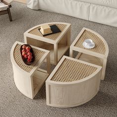 a coffee table with four tables on top of it