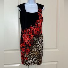 Cache Sleeveless Black Short Dress With Slimming Diagonal Leopard And Red Rose Print. Stretchy (Polyester And Spandex), Back Zipper. Comfortable And Easy To Pack. Perfect For A Fun Night Out, Cocktails Or Party! Dance The Night Away And Let Your Inner Leopard Come Out! Original Price $148. Nwt Red Floral Print Elegant Sleeveless Dress, Red Floral Print Fitted Sleeveless Dress, Red Fitted Sleeveless Dress With Floral Print, Fitted Red Floral Sleeveless Dress, Knee Length Floral Dress, Black Mermaid Dress, Split Sleeve Dress, Chiffon Halter Dress, Black Evening Gown