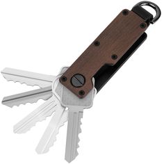 a wooden and metal swiss army knife keychain with two keys attached to it