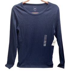 Gap Woman's Long Sleeve Crewneck Shirt, Size: Large Navy Blue Top 58% Prima Cotton, 39% Modal, 3% Spandex New With Tags Blue Relaxed Fit Shirt By Gap, Blue Relaxed Fit Gap Shirt, Basic Blue Tops For Fall, Gap Blue Relaxed Fit Shirt, Gap Blue Shirt Relaxed Fit, Long Sleeve Tops By Gap, Gap Blue Long Sleeve Shirt, Blue Long Sleeve Gap Shirt, Gap Long Sleeve Blue Tops