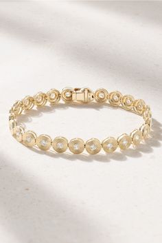 Sydney Evan’s bracelet is a modern take on classic tennis style. It's cast from 14-karat gold carved circle charms centered with tiny diamonds. Wear it solo or stacked with similar dainty pieces. Round Cubic Zirconia Diamond Bracelet, Round Cubic Zirconia Diamond Bracelet With Polished Finish, 14k Gold Bracelet With Diamond Accents, Elegant Yellow Gold Tennis Bracelet With Bezel Setting, Diamond Bracelet With Polished Finish, Modern Yellow Gold Round Diamond Bracelet, Yellow Gold Diamond Tennis Bracelet With Bezel Setting, Modern Yellow Gold Diamond Bracelet With Bezel Setting, Polished Diamond Tennis Bracelet