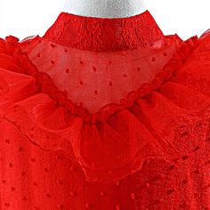 a red dress with ruffles on it