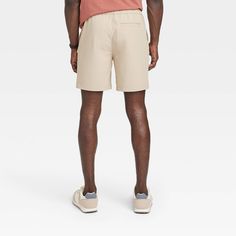 Elevate your casual ensembles effortlessly with these 7-Inch Regular-Fit Tech Pull-On Shorts from Goodfellow & Co™. These regular-fit shorts made from midweight woven fabric with four-way stretch make a comfy staple for everyday wear. Hitting above the knee, they're designed in a light taupe shade for easy coordination with a variety of casual looks. The front drawstring fastening offers a secure fit, while the side pockets and a back patch pocket provide space for your everyday essentials. Good Shipt Shopper, Back Patch, Everyday Essentials, Above The Knee, Online Purchase, Workout Shorts, Inside Pocket, Patch Pocket, The Knee