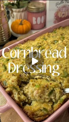 cornbread dressing in a pink casserole dish with the words cornbread dressing