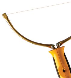 a pair of scissors is attached to a yellow handle on a white background with clippings