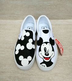 May 15, 2020 - Micky mouse Hand painted Slip-on. All Items is 100% hand painted with acrylic. They are water-proof and permanent so we guarantee no fading. When you place an order please allow 4-5 weeks in process to be completed and shipped out. You can also change the color, enter the name or customize whatever Vans Wallpaper, Disney Painted Shoes, Mickey Shoes, Vans Painted, Shoes Disney, Custom Vans Shoes, Mouse Paint, Slide On Sneakers