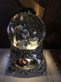 a snow globe sitting on top of a table