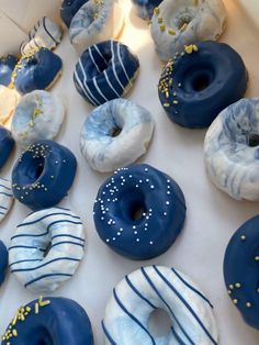 blue and white donuts with gold sprinkles