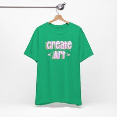 Express your passion for art with our "Create Art" graphic t-shirt. Designed to inspire artists and art teachers, this tee showcases a vibrant and eye-catching design that beautifully captures the essence of creativity. Made from premium quality materials, it offers both comfort and durability, perfect for everyday wear or as a statement piece in the art studio or classroom. Whether you're an artist seeking motivation or an art teacher looking to inspire your students, this tee is a must-have addition to your wardrobe. Makes a thoughtful gift for art lovers, creative souls, and the dedicated art educators in your life. Embrace your artistic spirit and let this tee be a symbol of your love for art and self-expression. .: 100% Airlume combed and ringspun cotton (fiber content may vary for di Art Teacher Tshirt, Multicolor Screen Print T-shirt For Artistic Expression, Graphic Tee T-shirt For Artistic Expression With Custom Artwork, Artistic Expression Multicolor Graphic Print T-shirt, Artist Tees, Rainbow Tee, Apparel Merchandising, Artist Gifts, Teacher Style