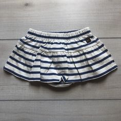 NEW Tea Collection Navy White Striped Skort - Sweet Pea & Teddy Cotton Bottoms With Ruffles For Playtime, White Ruffled Bottoms For Playwear, Cotton Bloomers With Elastic Waistband For Playwear, Summer Playtime Elastic Bottoms, White Cotton Diaper Cover With Elastic Waistband, Casual Diaper Cover With Elastic Waistband For Playtime, Bottoms With Elastic Waistband For Playtime, Casual Cotton Diaper Cover With Elastic Waistband, Playful Skirted Bottoms With Elastic Waistband