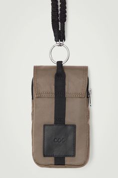 UTILITY LANYARD POUCH - NYLON - KHAKI - Bags and Wallets - COS Functional Phone Bag With Pockets, Functional Nylon Rectangular Phone Bag, Functional Rectangular Nylon Phone Bag, Functional Phone Bag Pouch For On-the-go, Functional Portable Phone Pouch Bag, Functional On-the-go Phone Bag Pouch, Functional Travel Phone Pouch, Functional Nylon Phone Bag With Cell Phone Pocket, Rectangular Nylon Phone Bag With Cell Phone Pocket