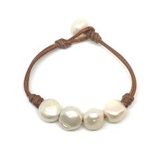 Elegant Leather Beaded Bracelets With Adjustable Fit, Handmade Adjustable Luxury Pearl Bracelet, Handmade Elegant Leather Bracelet, Elegant Handmade Leather Bracelet, Adjustable Luxury Pearl Bracelet, Elegant Round Leather Jewelry, Elegant Leather Beaded Bracelets As Gift, Luxury Adjustable Round Pearl Bracelet, Elegant Round Adjustable Leather Bracelet