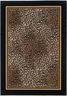 an animal print rug with gold trimmings and black border on the bottom half